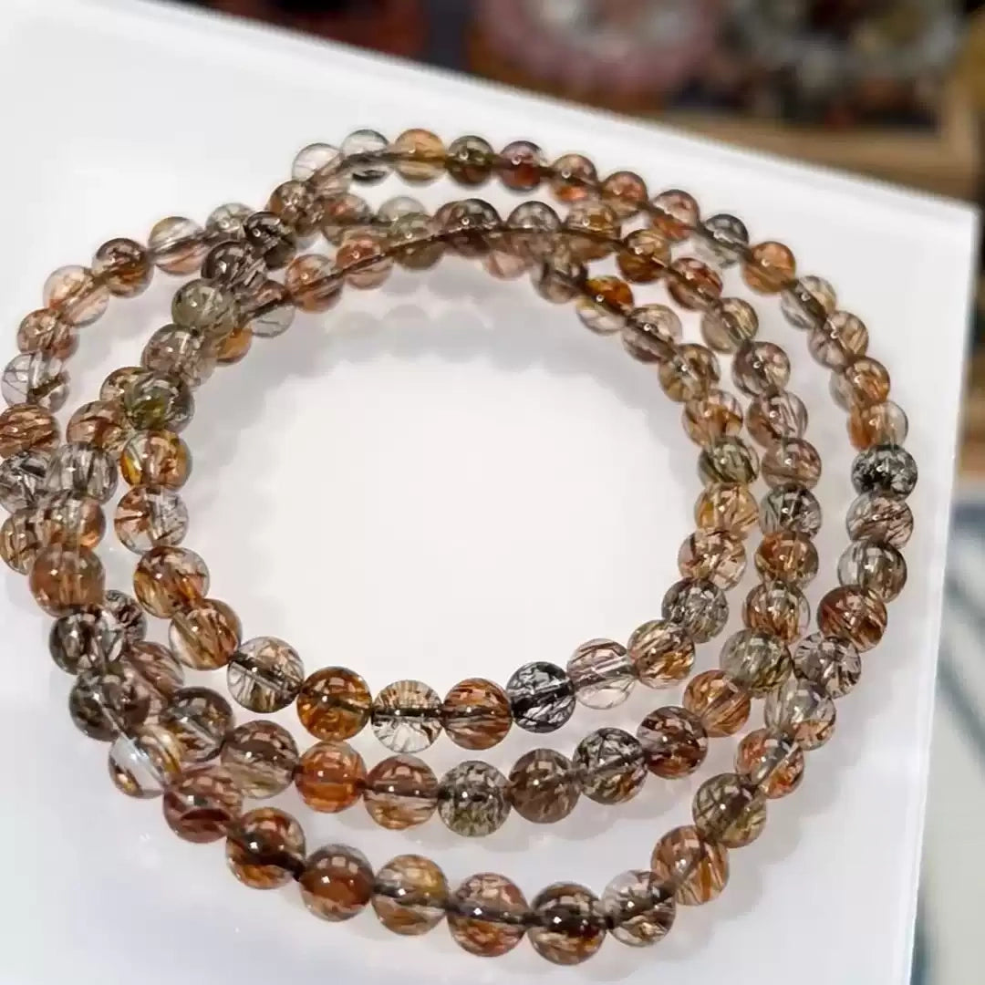 Triple-Wrap Black Gold Super Seven Bracelet