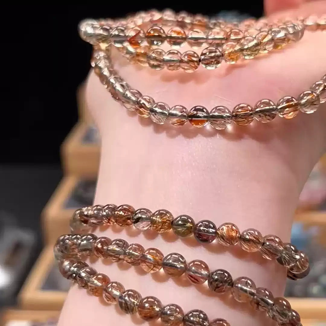 Triple-Wrap Black Gold Super Seven Bracelet